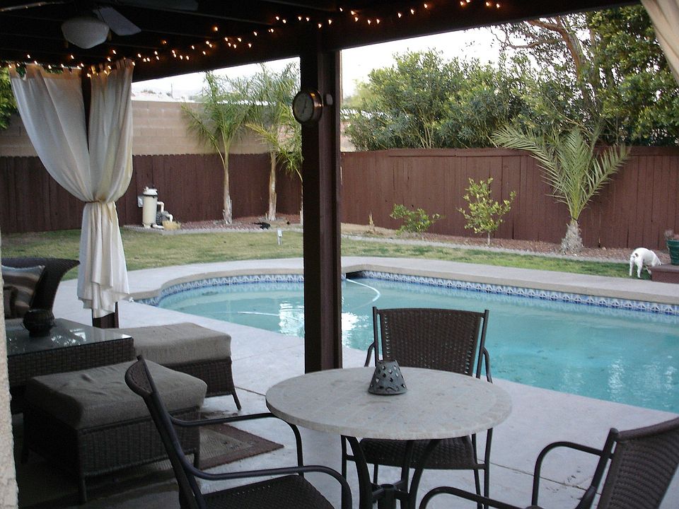 Pool with fenced in back yard