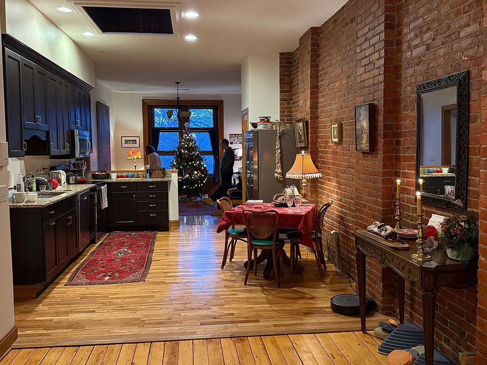 View from den to kitchen to living room