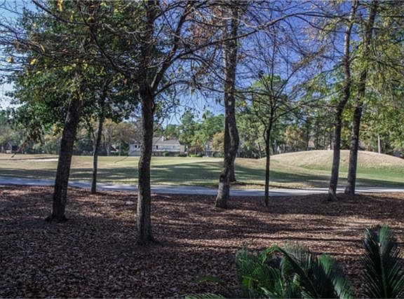 Situated on the #1 green of The Woodlands Country Club Tournament Course.