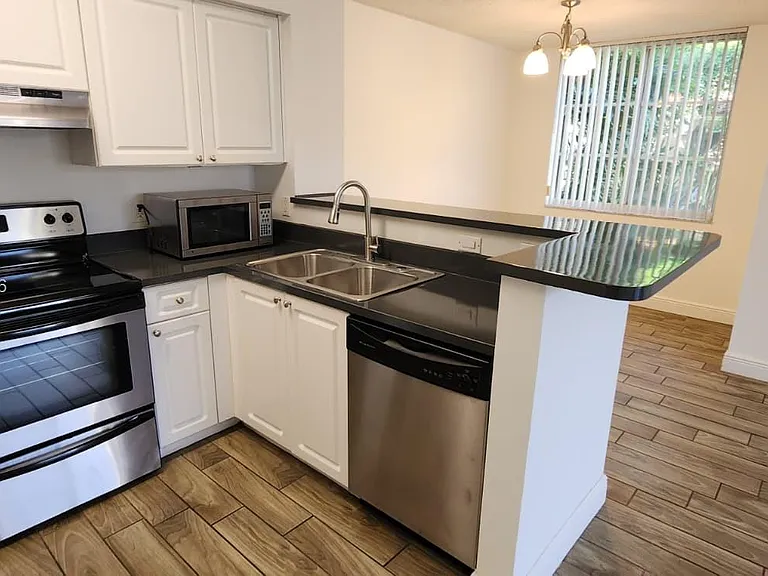 12148 Saint Andrews Pl #102 — Photo 6