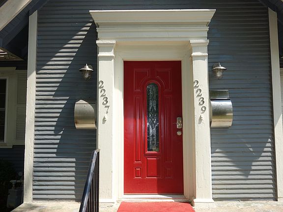 Single entry door Leads to Hallway with separate entries to units.