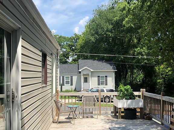 Back deck, entrance to bedroom through sliding glass door.