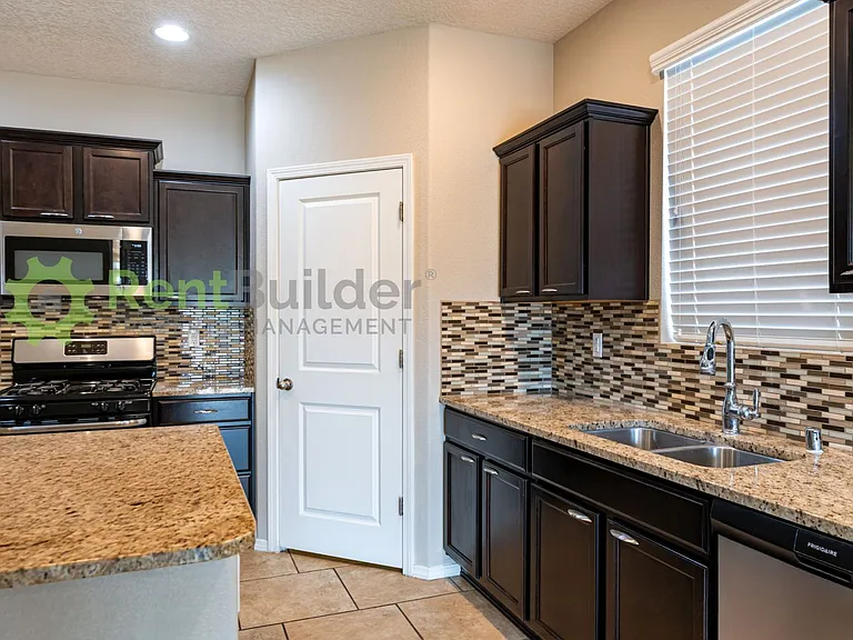 6936 Tombstone Rd NW — Photo 7
