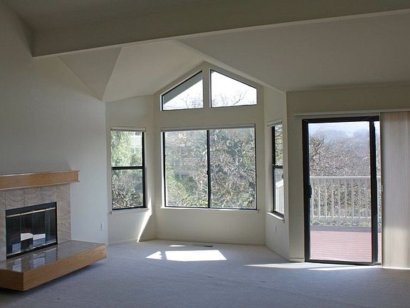 Spacious living room and dining room with views