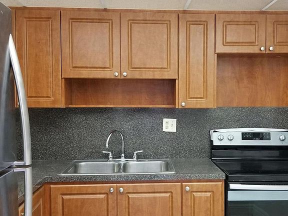 Kitchen with new stainless steel appliances