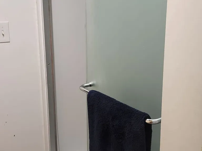 Apartment shower with one door open