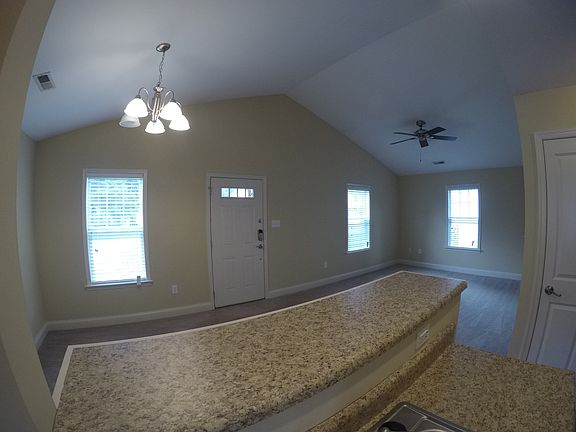 Open floor plan. Bar top.