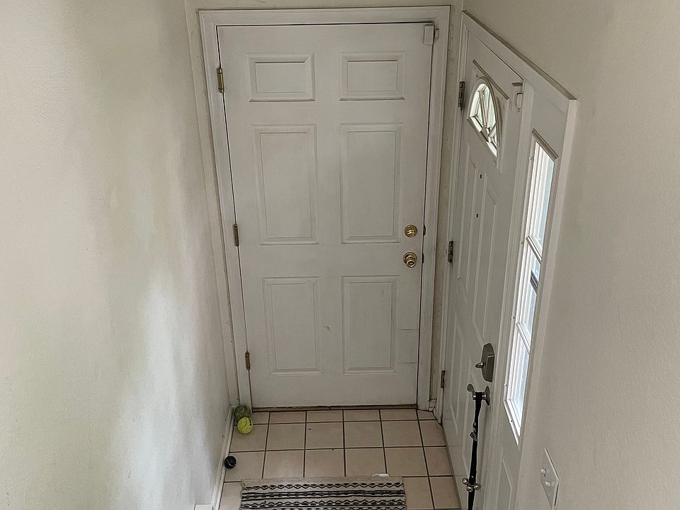 Entrance from garage and front door