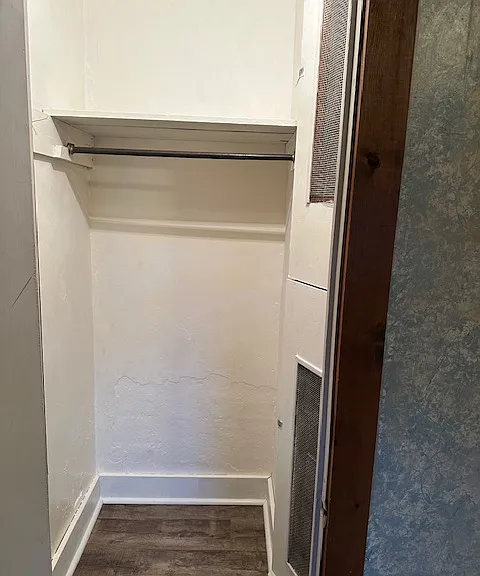 small walk-in closet in bedroom 3