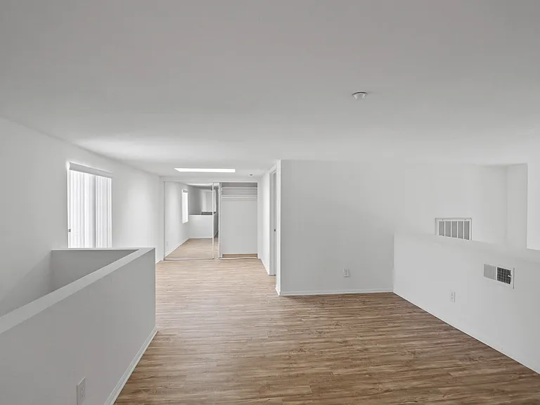 Spacious Loft with Vinyl Flooring, Mirrored Closet, and Patio