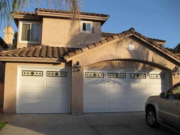 FRONT WITH 3 CAR GARAGE