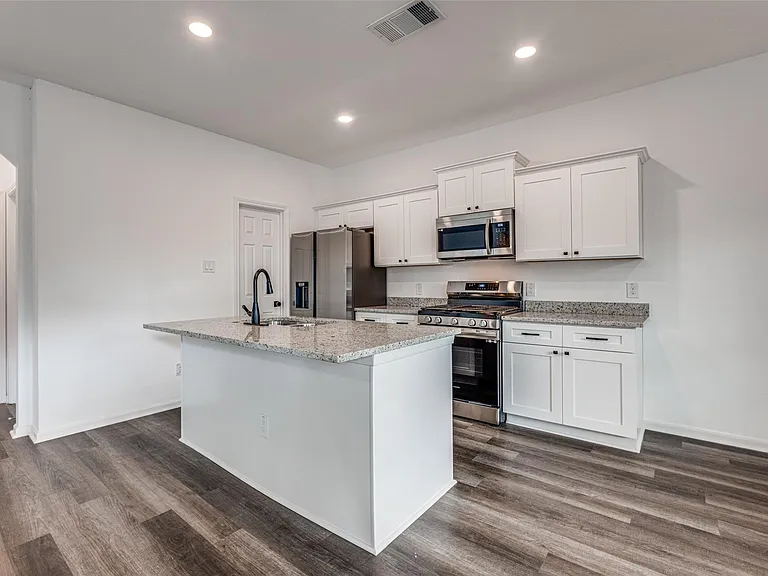 12721 Plummersville St — Photo 4