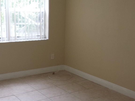 3rd image of 620 NW 179th St