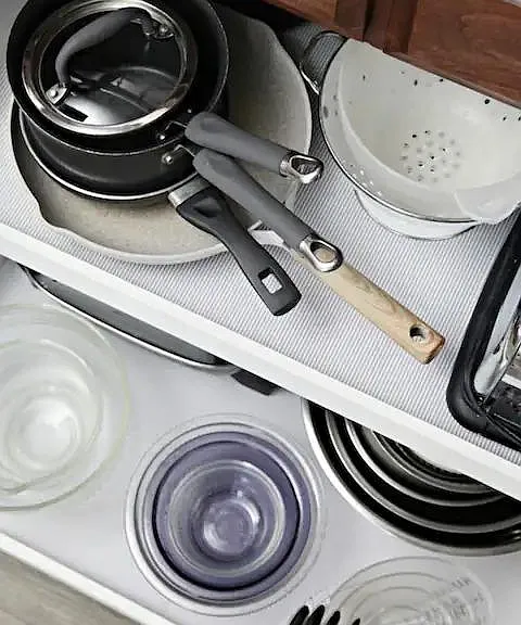 Cooking made easy! Our pans are neatly stacked and ready for delicious creations.
