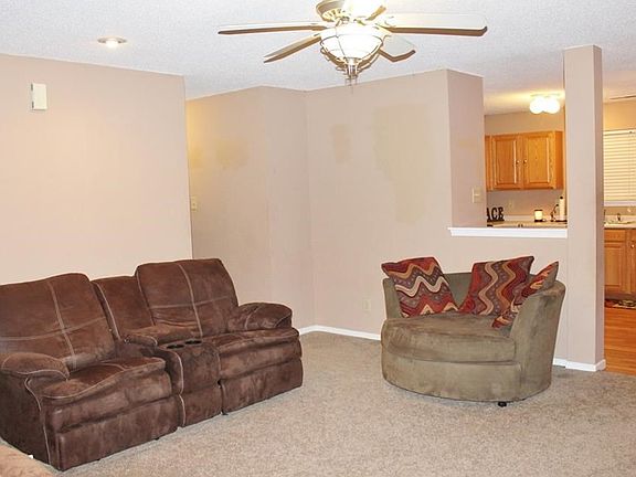Additional view of great room. Nice ceiling fan with light