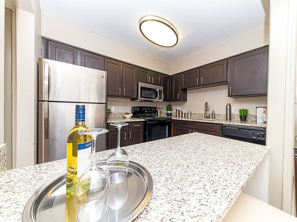Kitchen area with ample cabinetry & counter space