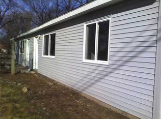 732 Six Mile Rd, Whitmore Lake, MI 48189