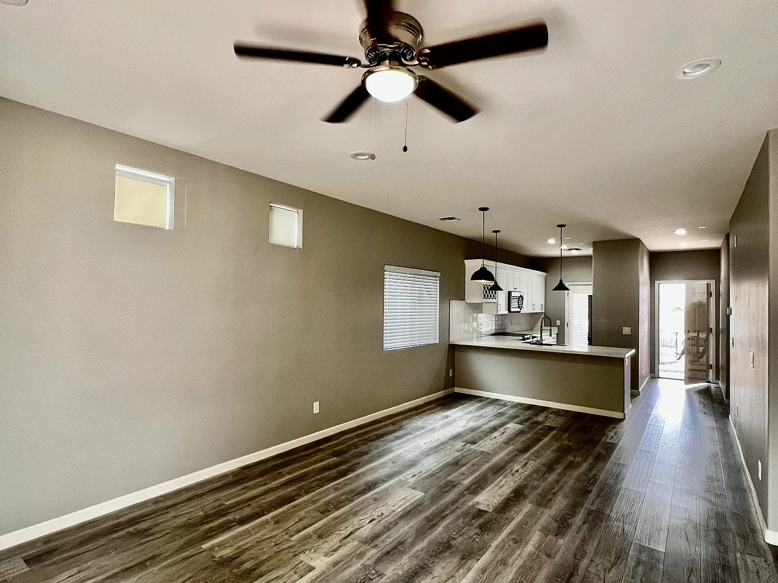 Stunning Home with Quartz Countertops, White Shaker Cabinets, and Stainless Steel Appliances — Photo 4