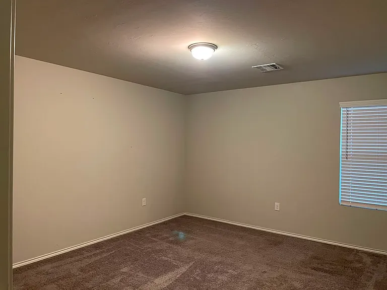 spacious master bedroom with a huge bathroom and walk-in closet