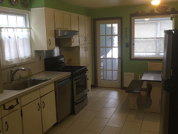 Large eat-in kitchen adjacent to laundry room