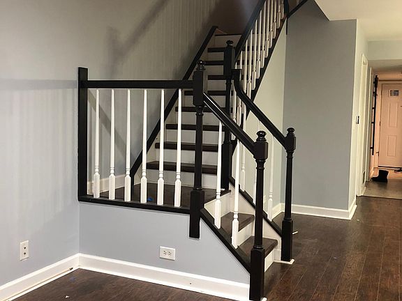 Stairs to Master suite with full bathroom and 2 bedrooms with 1 shared full bathroom
