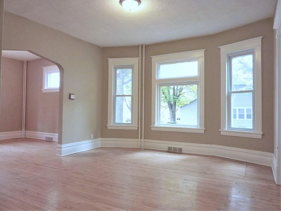 Open layout and lots of natural light in the Dining and Living Rooms
