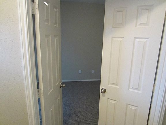 Double doors lead to study to the first left of hallway.
