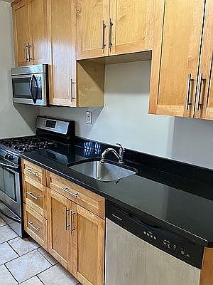 1st image of 102-12 65th Ave APT D24
