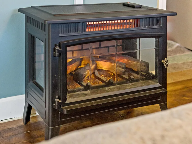 Electric infrared "fireplace" in bedroom for those cold nights