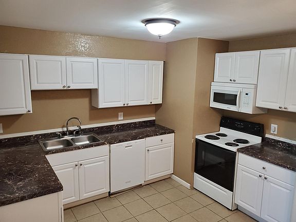 Kitchen boasts new cabinets and counter tops
