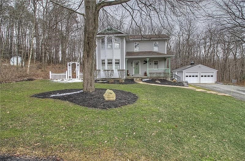 Your very own Ann Of Green Gables . Lush and green, surrounded by matures trees, this beautifully landscaped yard is waiting for