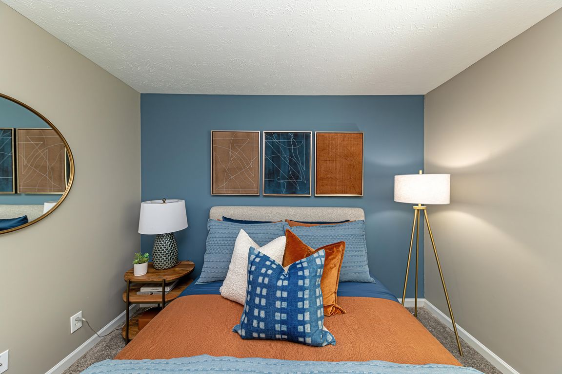 Cozy bedroom with carpet