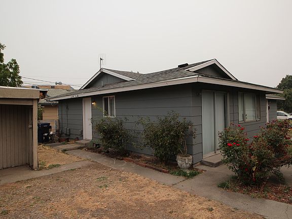 Unit 1221 closest to carport. Private lawn area at back entrance of unit. Professional lawn improvement in progress, seasonal lawn maintenance included. New Roof.