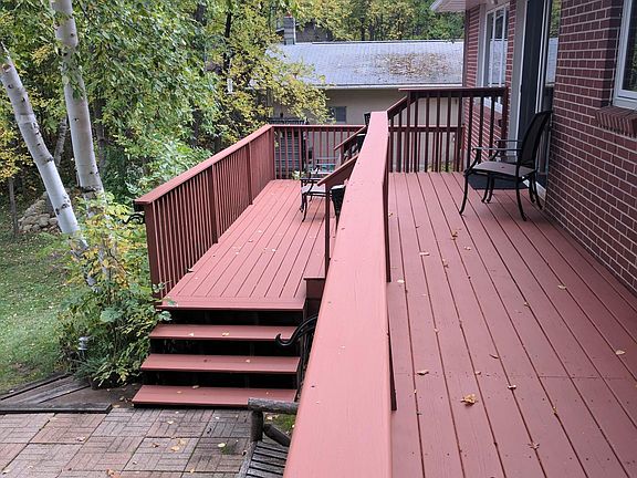 Deck coming out from master bedroom and family room.  Added 