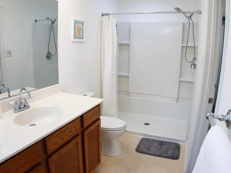 2nd floor bedroom on suite bathroom with shower.