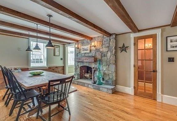 Dining room with butler's pantry and wine cooler.