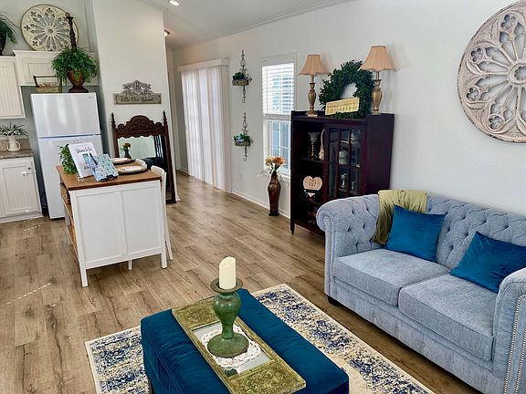Spacious living room with vaulted ceilings and tons of windows.