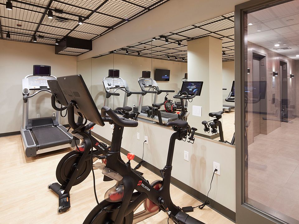 1,100 sf Fitness Center featuring Peloton bikes