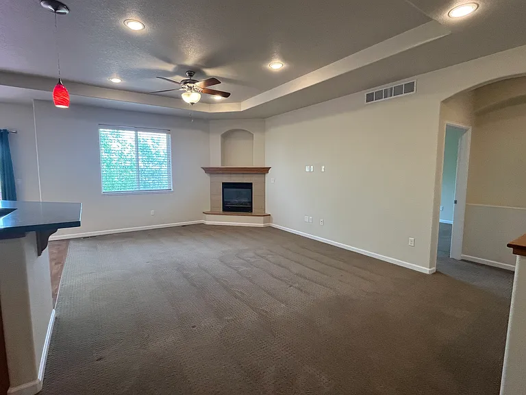 Living area with gas fireplace.