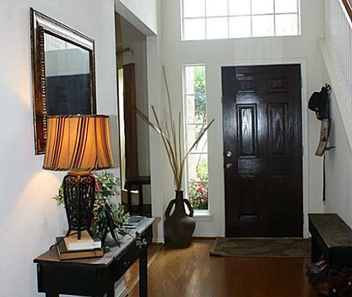 Welcome home into this fabulous entry with the formal dining on the right