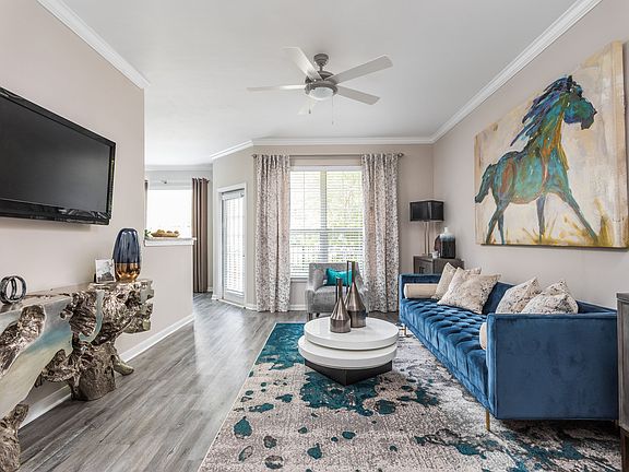 Living Room with Balcony Access - Oxmoor Apartments