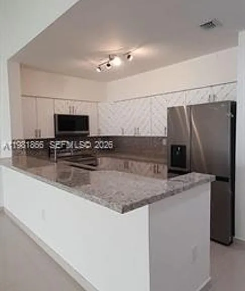 14728 Balgowan Rd #Townhouse 14728 — Photo 14