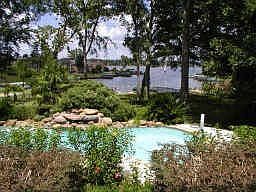 Sparkling Pool & Waterfall Overlook Lake Conroe