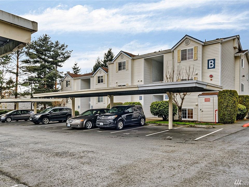 Ground floor condo with covered end parking spot. 