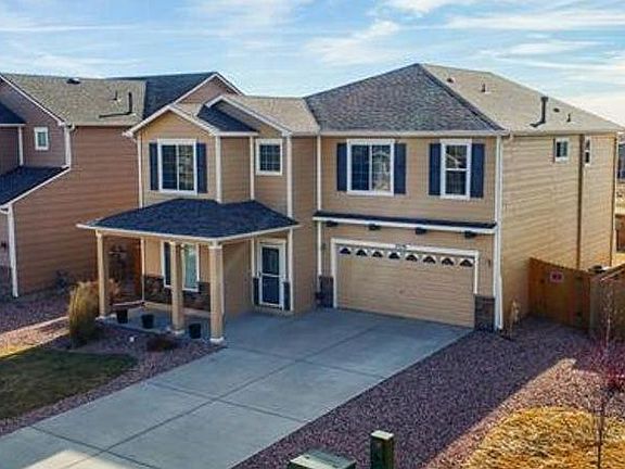 Two car garage and covered entry.