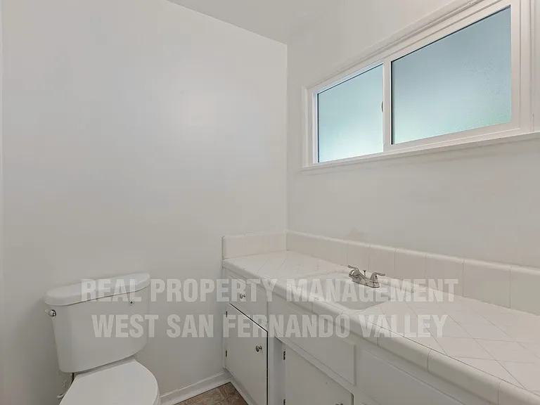 7749 Kentland Ave — Photo 20