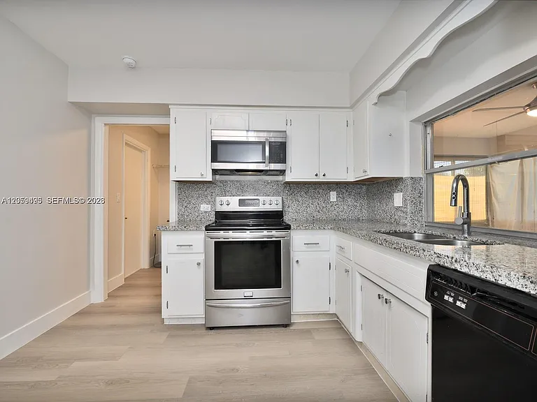 8691 NW 16th St — Photo 4