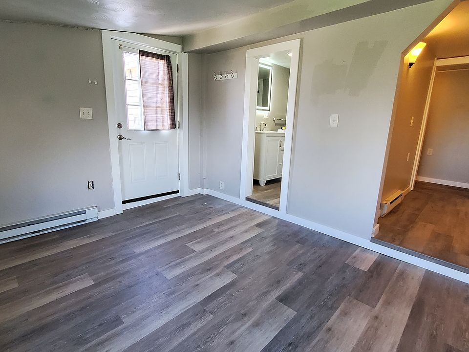 Living Room Looking towards bathroom and Kitchen