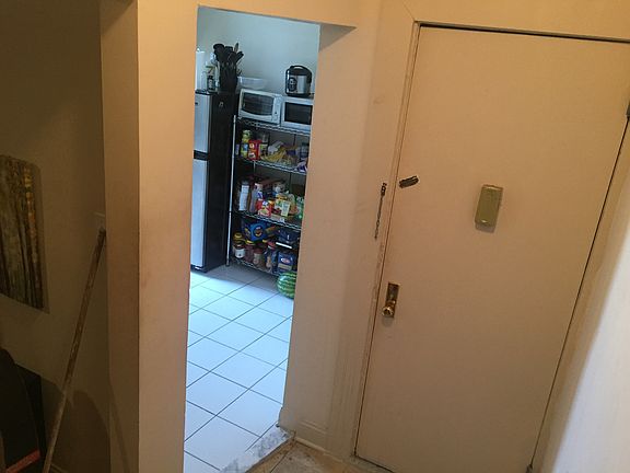 Kitchen while standing in foyer