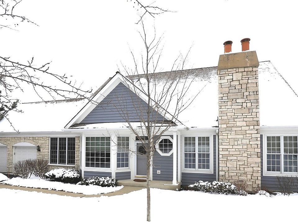 Fabulous, sun-filled end unit located across from pool and tennis courts. Private yard backs up to w